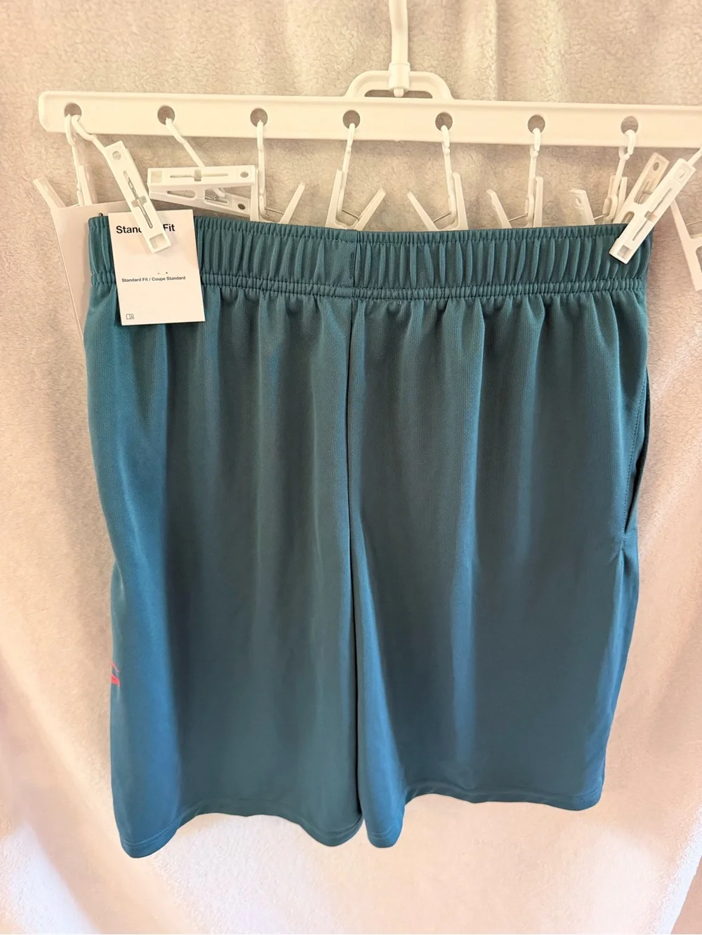 Nike Youth Teal Athletic Shorts with orange Logo Accent